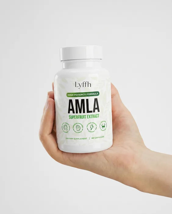 Amla Superfruit Capsules held in one hand