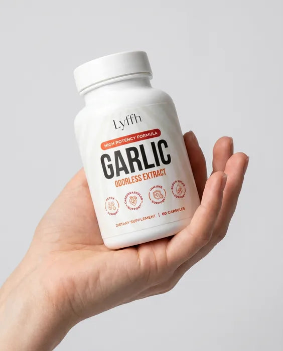 Odorless Garlic Extract Capsules held in one hand