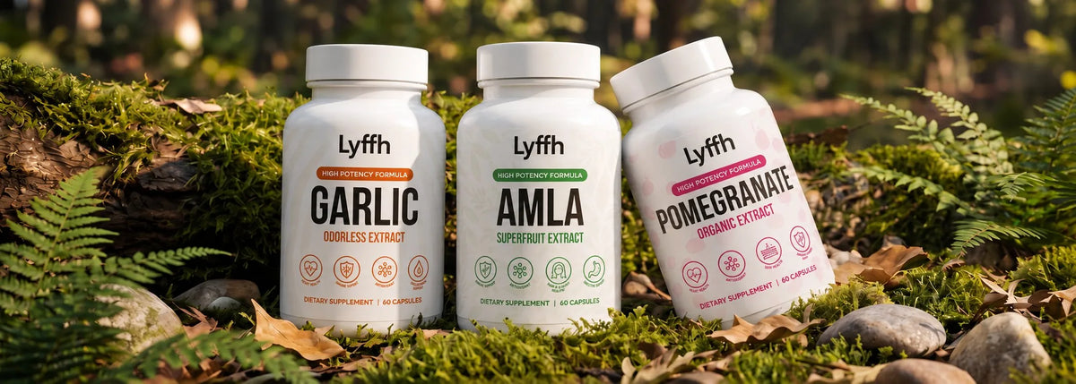 Lyffh Garlic, Amla and Pomegranate bottles on moss in a forest